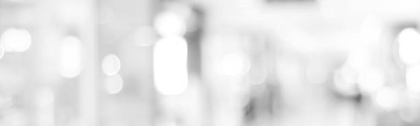 Blur abstract black and white bokeh festive light background, banner, backdrop, wallpaper
