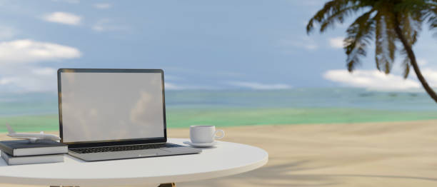 istock 3D rendering, portable workspace with laptop, books and cup in sea background 1309704465