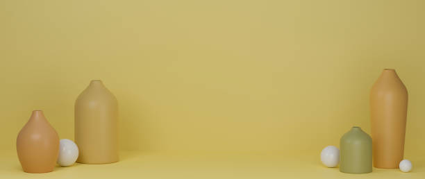 istock 3D rendering, yellow minimal ceramics vases and pot on yellow background with copy space, home decoration 1309704470