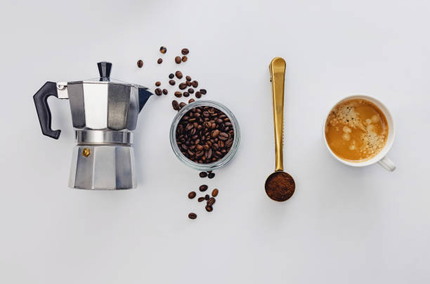 istock Ingredients for brewing coffee, overhead view on white background 1309704962