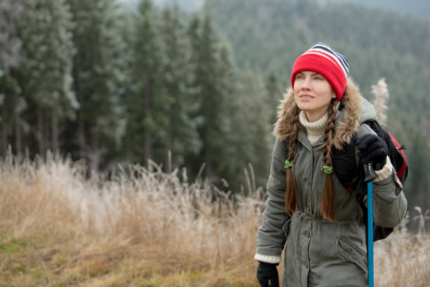istock Hiking woman in mountains 1309705989