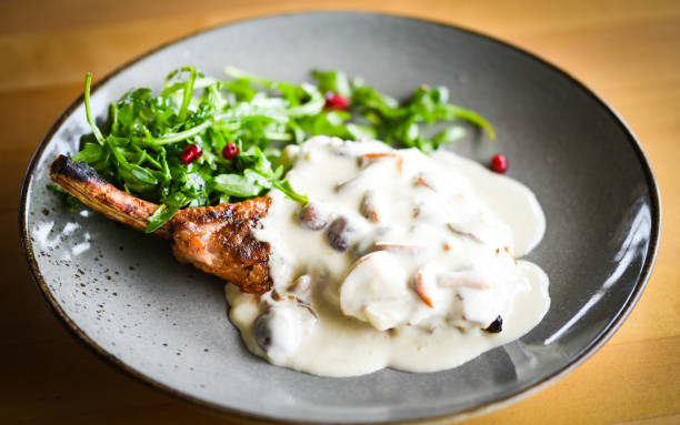 istock tasty pork cutlet & mushrooms sauce 1309707365