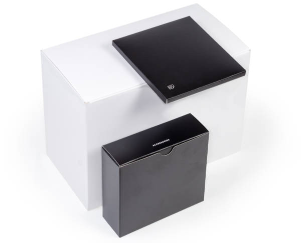 istock White cardboard packing box, small boxes with accessories and manual 1309709276