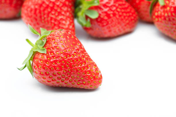 istock Red berry strawberry isolated on white background 1309712939