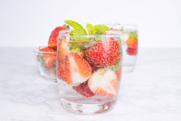 istock fresh fruit Strawberry with ice in glass 1309713877