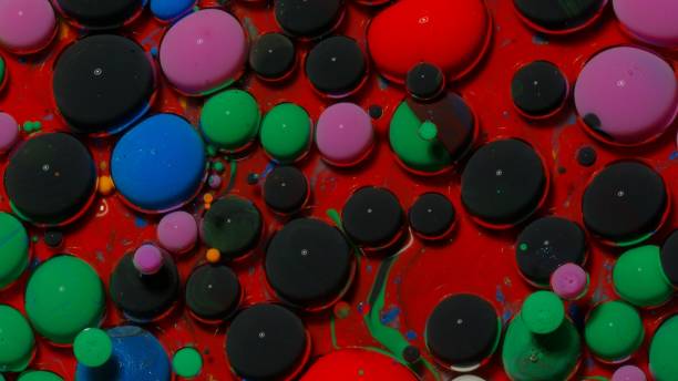 Colorful green black bubbles surface wallpaper themes background, multicolor space universe concept