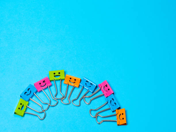 istock Funny smile metal binder clip 1309714889