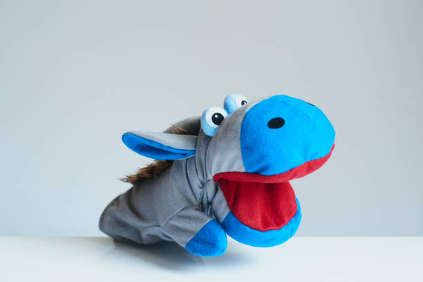 istock cute animal puppet, donkey 1309715929