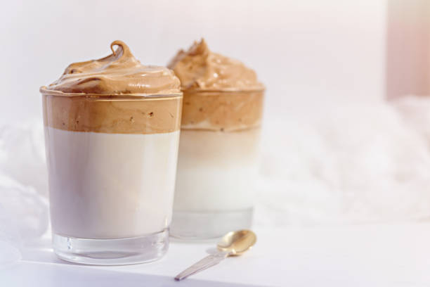 istock dalgona coffee with whipped foam in glasses on white background in morning light 1309717609