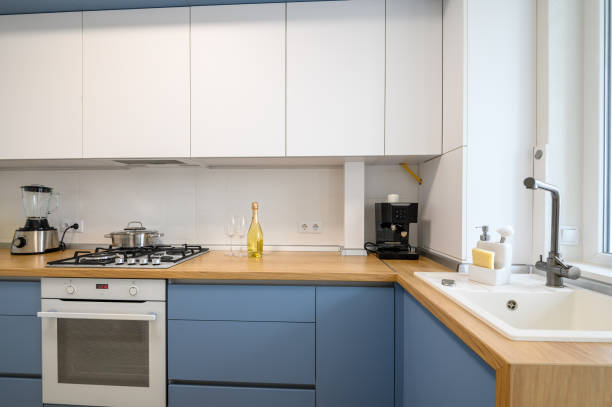 istock Modern blue-teal colored furniture kitchen interior 1309717672