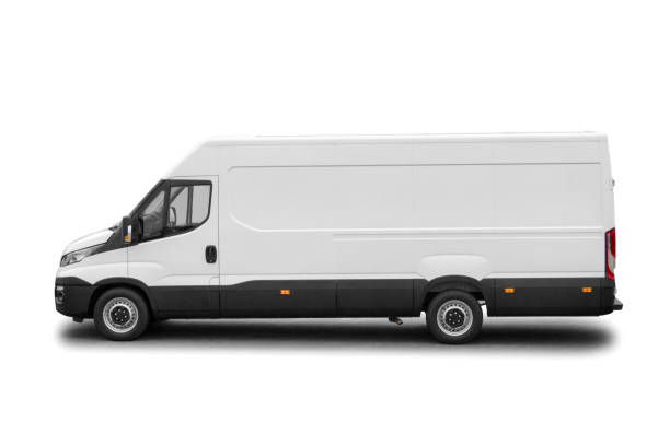 istock Side view of long white van with copy space isolated on white background 1309721520