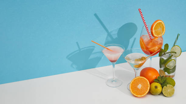 istock Cocktails set. Glasses with various cold  beverages on double white blue background with shadow. Copy space. Cocktail bar 1309722520