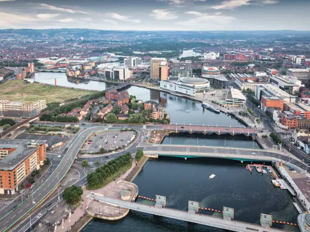 Belfast Northern Ireland River Lagan. Aerial view over downtown Belfast along the River Lagan with Lagan Weir Bridge in the foreground, ICC Belfast, Lagan Boat and Victoria Square Dome. Belfast, Northern Ireland, United Kingdom, Europe