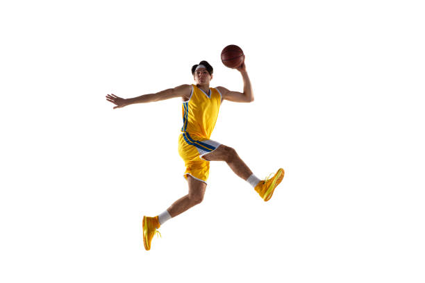 istock Young Caucasian basketball player training isolated on white background. 1309725082