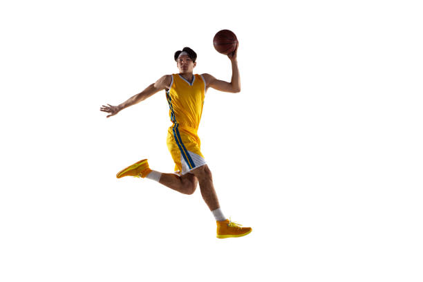 istock Young Caucasian basketball player training isolated on white background. 1309725147