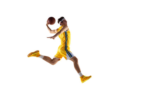 istock Young Caucasian basketball player training isolated on white background. 1309725724