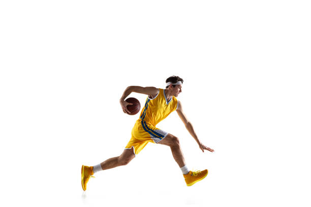 istock Young Caucasian basketball player training isolated on white background. 1309725733