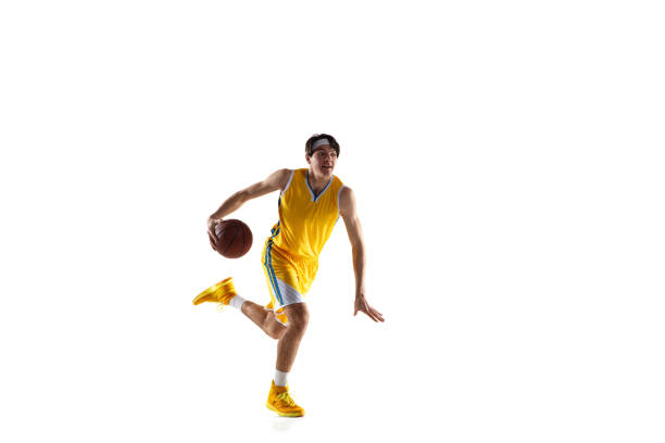 istock Young Caucasian basketball player training isolated on white background. 1309725759