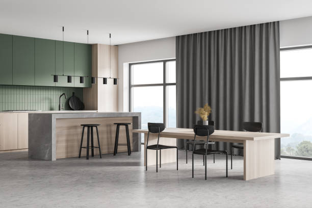 istock Light wooden kitchen room with eating table, window and parquet 1309730163