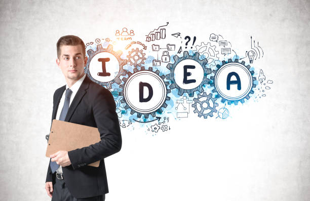 istock Man with clipboard and his idea 1309731120