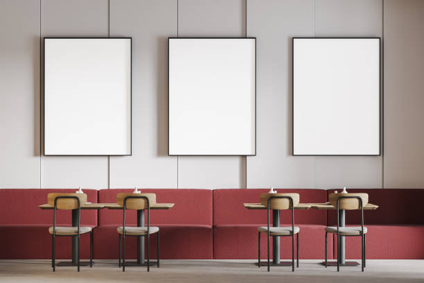 istock Mockup frames in cafe with red sofa and wooden table with chairs 1309731811
