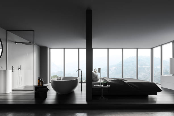 istock Panoramic gray bedroom and bathroom interior 1309731883