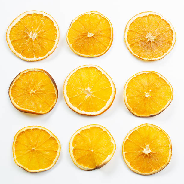 istock Slice orange fruit isolated on white background. flat lay, top view 1309731887