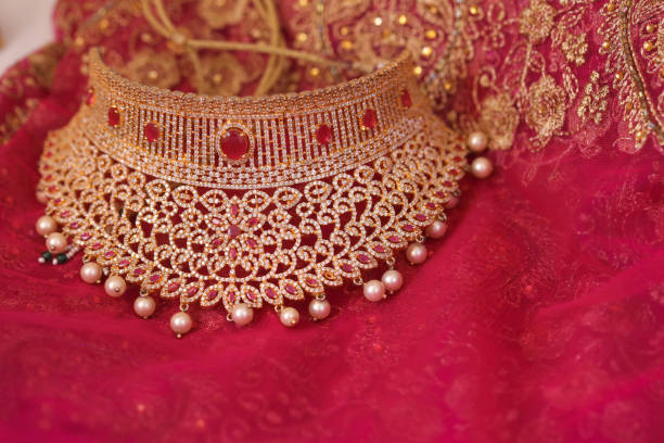 istock various gold jewelry accessories 1309732624