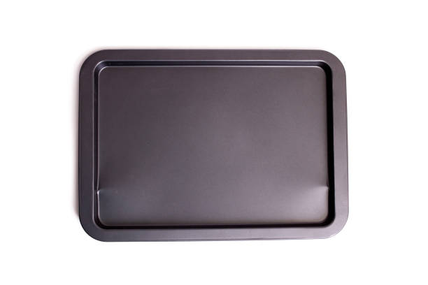 istock Metal baking sheet for cooking isolated on white background 1309735975
