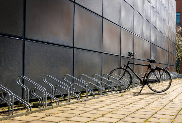 High angle view of a bicycle parking station with an electric push scooter in the city of Castellón de la Plana, Valencian Community, Spain