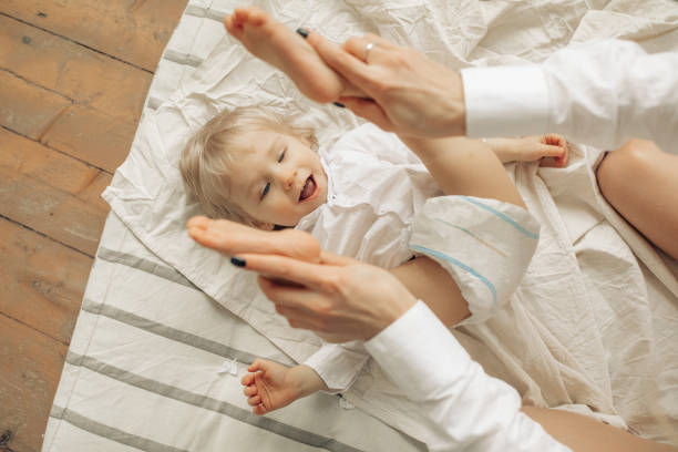 istock Happy mother plays with her little son. 1309739015