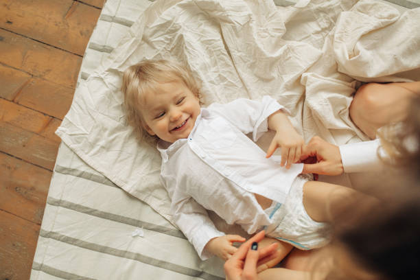 istock Happy mother plays with her little son. 1309739163