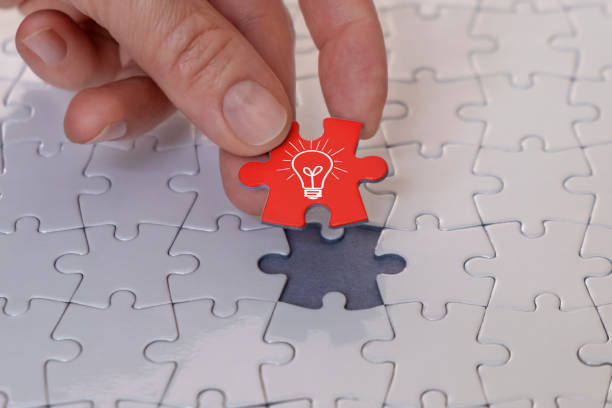 istock New idea on the puzzle piece 1309740442