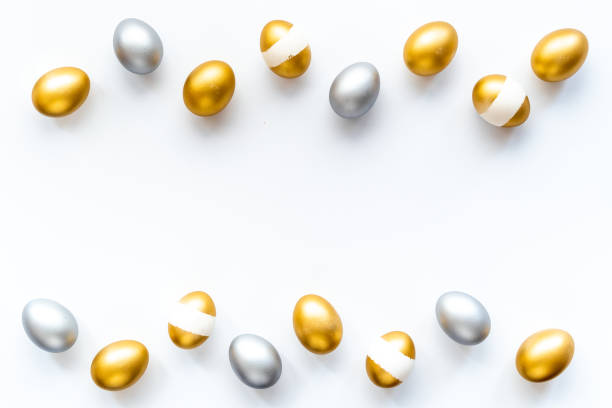 istock Golden and silver eggs frame. Wealth and good luck concept. Easter decoration 1309741691