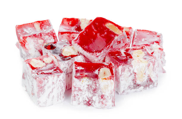 istock Close up of red Turkish Delight sweets isolated on white 1309743864