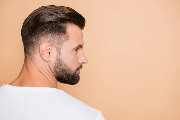 istock Profile side photo of young bristle handsome man serious look empty space isolated over beige color background 1309745253