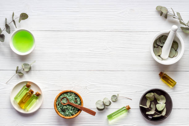 istock Essential oil in glass bottle, herbs with eucalyptus. Space for text 1309746076