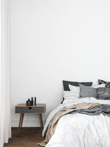 istock White bedroom interior with decor. 3d render illustration mock up. 1309746929