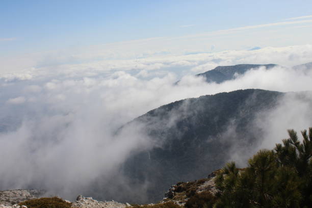 istock Cloudy sky and fog on the mountain 1309749000