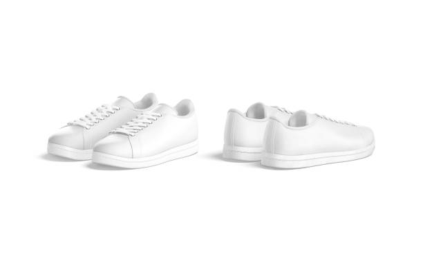 istock Blank white leather sneakers with lace mockup, front and back 1309751718