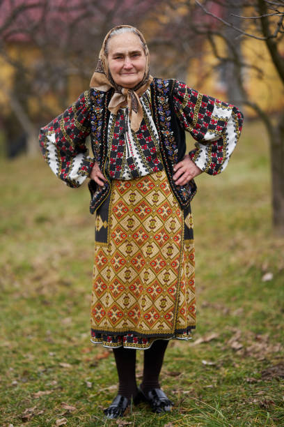 istock Old Romanian woman outdoor 1309754831