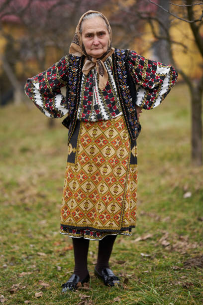 istock Old Romanian woman outdoor 1309754892