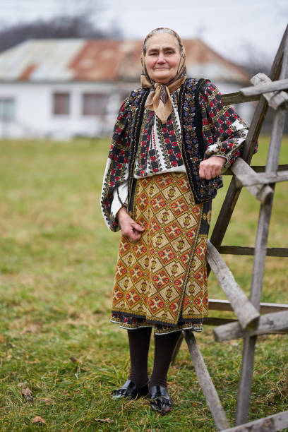 istock Old Romanian woman outdoor 1309755043