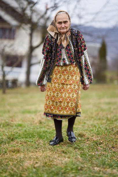 istock Old Romanian woman outdoor 1309755132