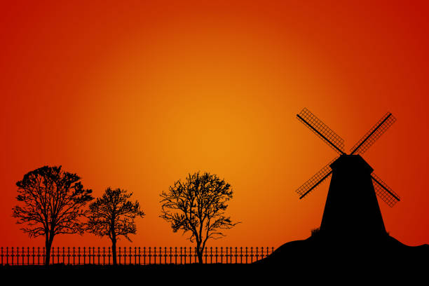 krajobraz z wiatrakiem, drzewami i sylwetką ogrodzenia na pomarańczowym tle nieba. - netherlands windmill farm farmhouse stock illustrations