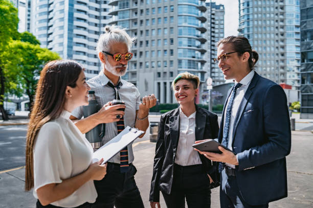 istock Business people discussing outdoors 1309757486