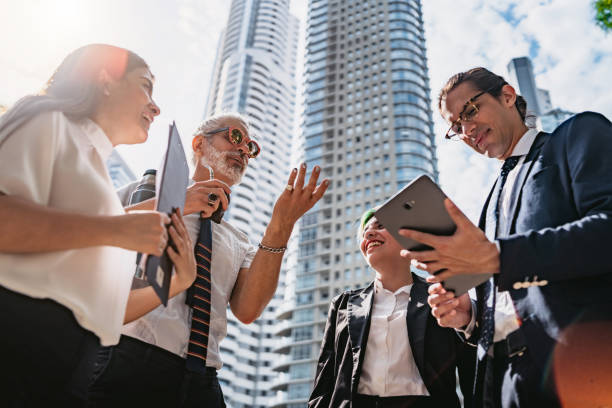 Business people discussing outdoors