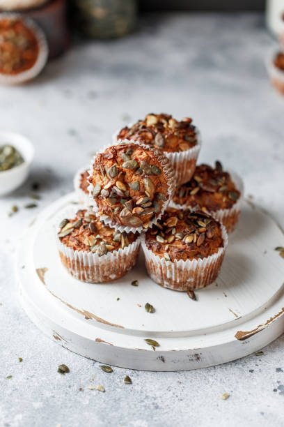 istock Apple muffins with whole grain flour with pumpkin seeds 1309758077
