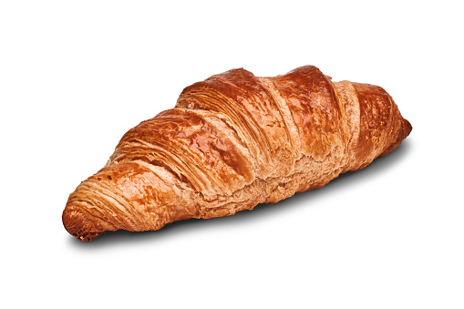 French croissant isolated on a white background. Sweet pastries.