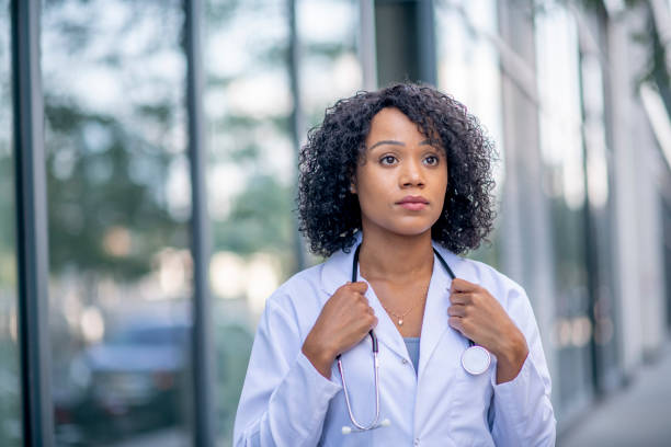 istock Young female doctor looking into the future 1309759252